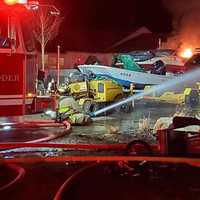 <p>Longmeadow firefighters battle a blaze on Dunn Road over the weekend.</p>