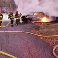 <p>A car caught on fire in Somers on Nymph Drive near Lake Lincolndale.</p>