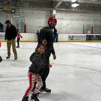 <p>Aria ice skating with her dad Timothy.</p>