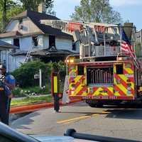 <p>Fire severely damaged the home at 92 Knickerbocker Road off the corner of West Demarest Avenue on Saturday, May 27.</p>