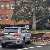 <p>The Jeep Cherokee from Dumont hit a brick wall outside the rectory of St. John the Evangelist R.C. Church at North Washington and Bradley avenues in Bergenfield.</p>