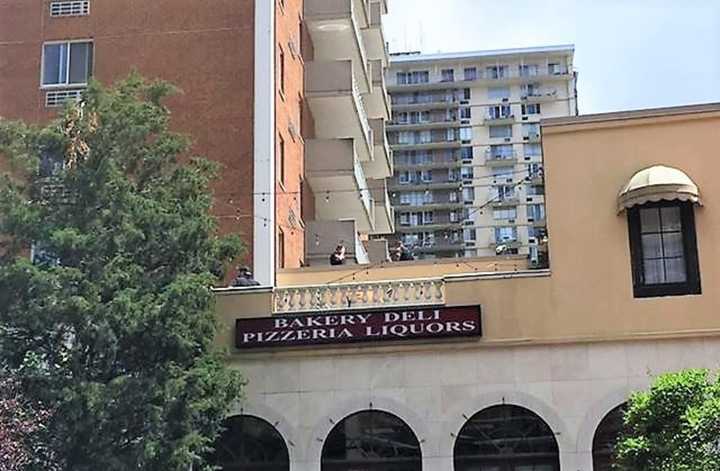 Emergency responders on the roof of Picco Tavern.