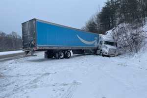 Jackknifed Tractor-Trailer Spills Fuel On Snow-Covered I-84 Stretch