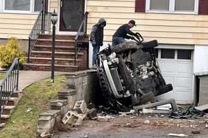 WILD ONE: Jeep Hits Three Homes, Rolls, Lands Sideways, Driver Survives: Hasbrouck Heights PD