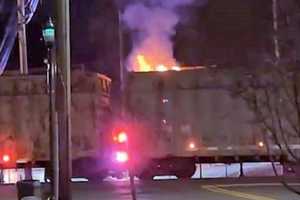 Firefighters Douse Overnight Freight Train Blaze In Maywood