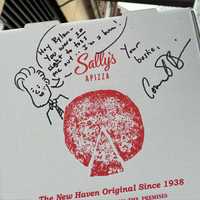 <p>One of the signed pizza boxes.</p>