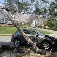 <p>The Audi Q7 SUV shattered the utility pole on West End Avenue in Ridgewood around noon Saturday, April 8.</p>