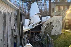 Small Plane Clips Roof Of CT Home, Crashes Into Shed