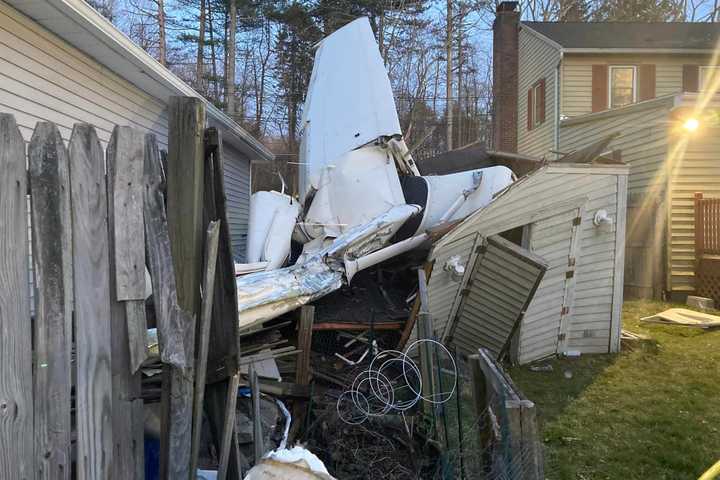 Small Plane Clips Roof Of Danbury Home, Crashes Into Shed