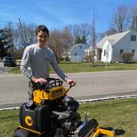 <p>West Islip High School senior Quinn Bedell, age 18, hard at work running his own landscaping company, Q-Man&#x27;s Landscaping.</p>