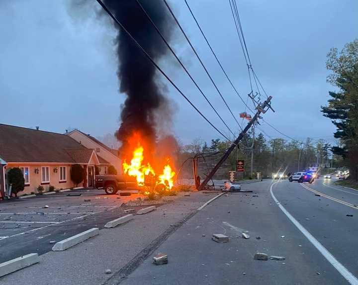 A fiery crash shut down part of Route 16 in Mendon on Friday morning, May 5