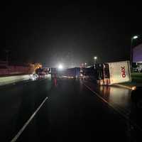 <p>The tractor-trailer tipped outside Jack Daniels Porsche on southbound Route 17 in Upper Saddle River around midnight Saturday, April 29.</p>