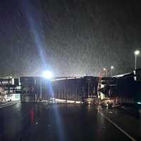 <p>The tractor-trailer tipped outside Jack Daniels Porsche on southbound Route 17 in Upper Saddle River around midnight Saturday, April 29.</p>