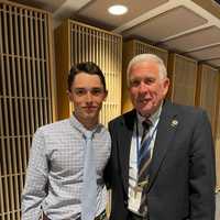 <p>West Islip High School senior Quinn Bedell (left) with former West Islip teacher and Board of Education member Tom Compitello.</p>