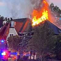 <p>At the scene of the fire at 98 Carlough Road, Upper Saddle RIver, on Saturday, May 27.</p>