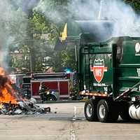 <p>Wyckoff firefighters and DPW workers contained a garbage truck fire in the municipal complex on Wednesday, May 24.</p>