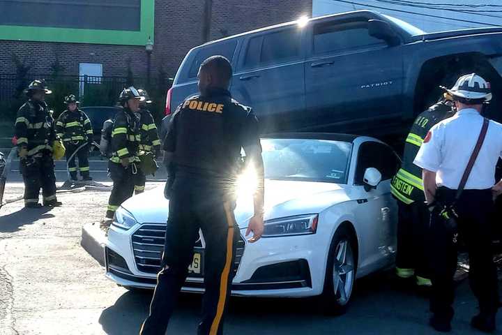 Double-Decked: Flying Jeep Lands On Sedan In Hackensack