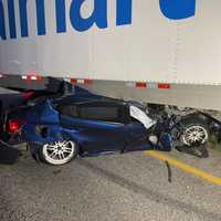 <p>A close-up of the car under the trailer.</p>