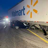 <p>The Walmart Tractor-trailer crushing a sedan on Interstate 81.</p>