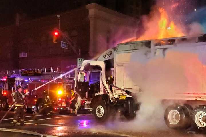 RAISING A STINK: Trash Mountain Burns In Middle Of Cliffside Park Intersection