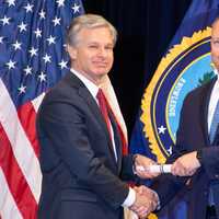 <p>New Milford Police Chief Brian Clancy with FBI Director Christopher Wray</p>