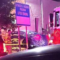 <p>The vehicle was covered in a tarp following the horrific crash on Broad Avenue in Ridgefield around midnight Saturday, June 24.</p>