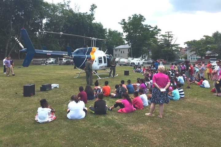 Englewood Police Treat Youngsters To Helicopter, Free Backpacks