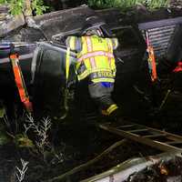 <p>The Chevy Silverado landed on its side after crashing through the guardrail just past Sheridan Avenue on southbound Route 17 in Waldwick.</p>