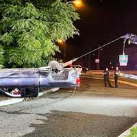 <p>Waldwick firefighters cut a section of guardrail away so the pickup could be removed following the crash off southbound Route 17 at Sheridan Avenue in Waldwick.</p>