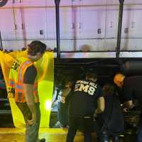 <p>The crews working to free the person from under the train&#x27;s wheels.</p>