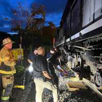 <p>The crews at work after a person was hit by a New Jersey Transit train in Spring Valley.</p>