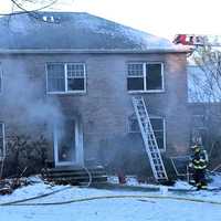 <p>The Oweno Place home was severely damaged.</p>