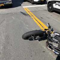 <p>The driver of a minivan ran a red light in Ramapo, striking a motorcyclist, who was treated for non-life-threatening injuries.</p>