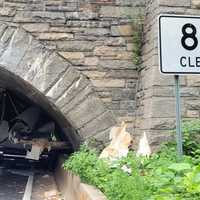 <p>A truck slammed into a low-clearance bridge on the northbound Saw Mill River Parkway in Pleasantville at Bedford Road, police said.</p>