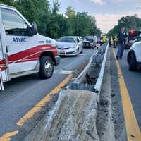 <p>A car went airborne after striking a guardrail on the Saw Mill River Parkway in Dobbs Ferry, landing on two other vehicles.</p>