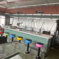 <p>A 1953 Deraffele Stainless Steel Diner interior.</p>