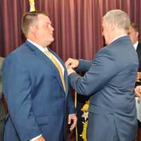 <p>Jeffery Hunt being pinned with his new WCPD shield by his father Lieutenant Jeffery Hunt.</p>