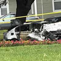 <p>The BMW collided with the Long Branch police SUV and burst into flames, witnesses said.</p>