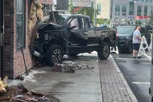 Man Crashes Truck Into Cars, Building Before Running Away In Eastern Mass