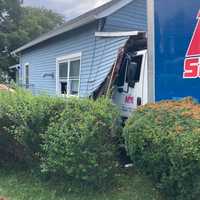 <p>The cab of the tractor-trailer into the home in Lebanon.</p>