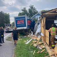 <p>The scene of the tractor-trailer into a Lebanon home.</p>