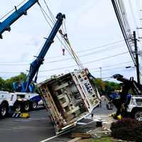 <p>A group of heavy wreckers was needed to right and remove the Hasbrouck Heights garbage truck from northbound Route 17.</p>