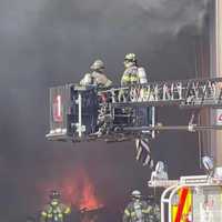 <p>Goshen firefighters on the scene of the fire.</p>