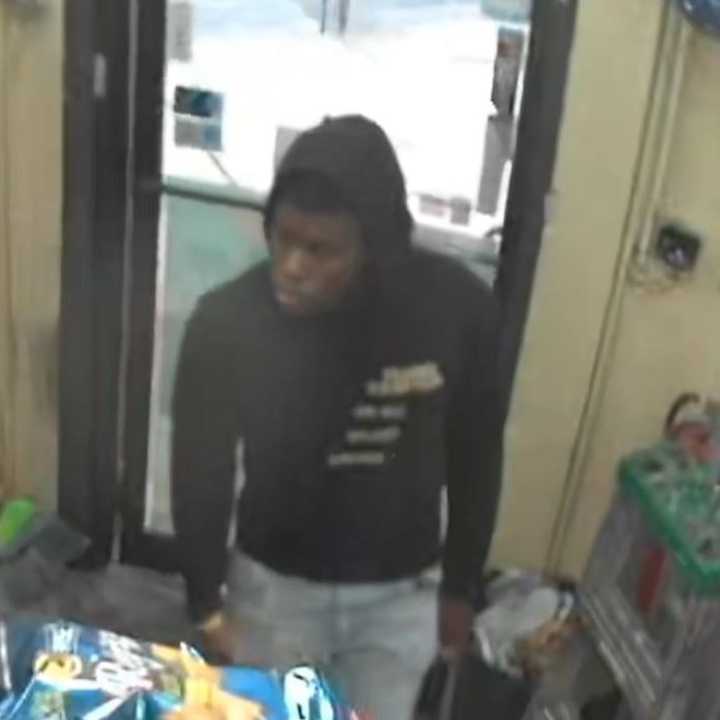 One of the suspects wanted for an armed robbery.