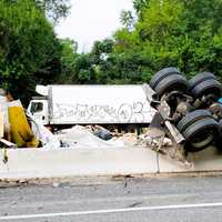 <p>The driver was initially entrapped but climbed out on his own after his northbound rig went over the divider near the Route 202 exit at Mountainside Avenue at 8:43 a.m. Sept. 8, Mahwah Police Chief Timothy O&#x27;Hara said.</p>