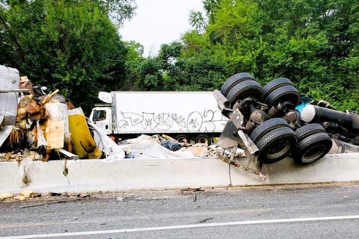 UPDATE: Tractor-Trailer Tips Over Median, Dumps Trash Across Treacherous Stretch Of Route 17