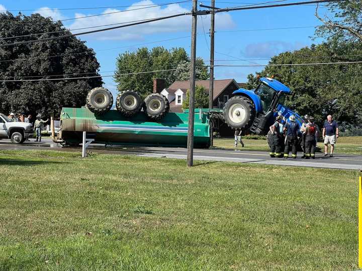 The trailer of manure flipped over on US 11.