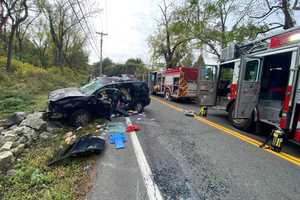 Rollover Crash: Victim Extricated From Damaged Car In Garrison