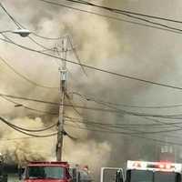 <p>Multiple fire departments battled the blaze.</p>