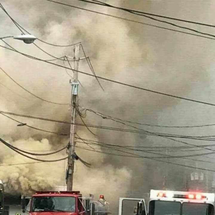 Multiple fire departments battled the blaze.